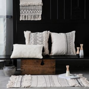 Geometric black and white tufted tassel pillow